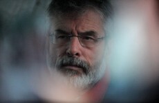 Adams to meet family of prison officer shot dead in Dublin