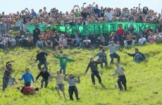 Photos: One winner, many losers at annual cheese rolling race