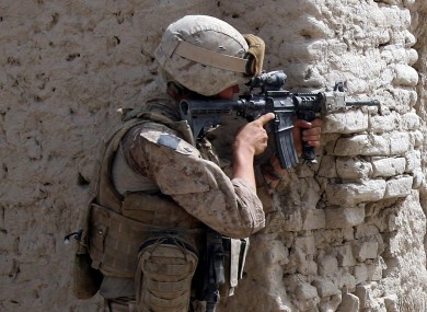 A US Marine serving in Afghanistan. A military court has ruled that it is permissible to wear some items of a military uniform while filming pornography.