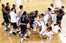 Brawling US and Chinese teams say sorry - and swap souvenirs