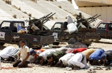 Gaddafi: "I won't surrender"