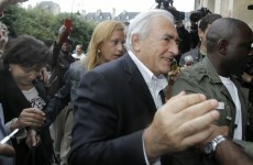 Strauss-Kahn returns to frosty reception and uncertain future
