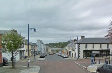 Car with six people on board crashes through garden fence