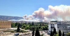 A large-scale wildfire is blazing just outside Athens