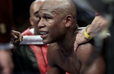 WATCH: Mayweather wins in fourth round KO in controversial clash