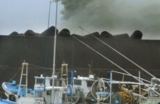 Japan typhoon kills 13 and dumps rain in tsunami zone