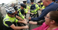 Pictures: Water protesters clash with gardaí at Joan Burton food bank event