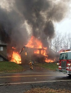 Nine killed after plane crash destroys apartment building