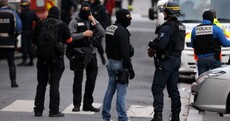 Paris shootout sees two killed and eight arrested but fate of 'mastermind' unknown