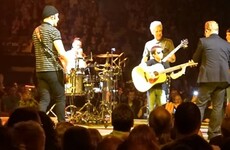 Bono brought up a tiny U2 fan to sing and play guitar on stage last night