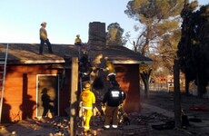 Suspected burglar killed after fire lit in chimney he was stuck in