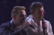 'We will never give up': Eagles of Death Metal join U2 on stage in Paris