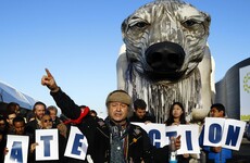 Giant polar bear among protesters at Paris climate talks
