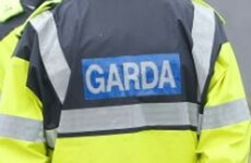 Man arrested over shooting that saw bullets strike passing car