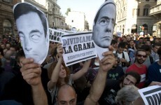 Scandal-hit Berlusconi under siege as allies desert him