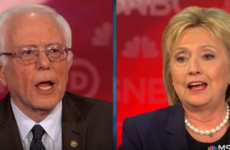 Democratic candidates lock horns for first time as Clinton accuses Sanders of "artful smear"