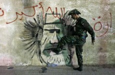 Gaddafi's body being kept in shopping centre freezer