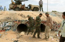 Libya: official says Gaddafi was buried at dawn