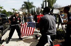 'All hell breaks loose' as protesters clash with Ku Klux Klan at rally