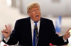 Secret service agents jump on stage at Trump rally after scuffle