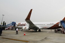 Planes catch fire after colliding on runway at airport