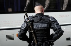 Police force migrants from school using tear gas