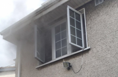 Parent and baby rescued from roof after fire breaks out at Dublin house