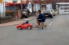 This dad let his toddler give him a lift home on the back of his electronic toy car