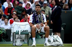 Djokovic saved by rain as Querrey takes two-set lead