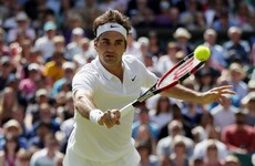 Federer battles from two sets down to win epic Wimbledon 1/4 final