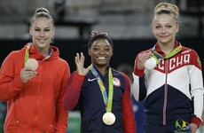 US teenage prodigy Biles secures gold medal hat-trick