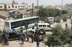 This town has been under armed siege for four years - but it ended today amid tears and recriminations