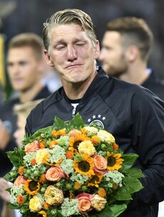 Tearful Schweinsteiger bows out in Germany's win over Finland