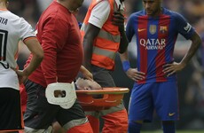 Tearful Iniesta suffers knee injury