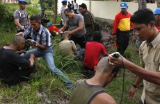 Hard-line Indonesian police shave punks' mohawks