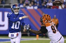 Manning throws three touchdown passes as gambling Giants beat Bengals