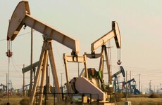 Oil prices are climbing after major producers' first output cut in eight years