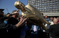 Israelis have toppled a huge golden statue of Benjamin Netanyahu in Tel Aviv