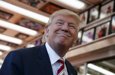 Trump defends appointing a climate sceptic and a fast food boss to his Cabinet