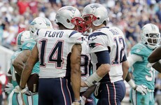 Brady leads Patriots to AFC top spot with win over Dolphins
