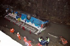 16 killed after bus slides off snow-covered bridge