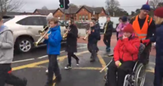 Using a wheelchair, Vera Twomey nears the end of her trek to Dublin for her daughter