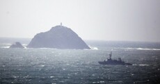 In 'hostile conditions', searchers find section of Coast Guard helicopter on Black Rock