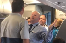'Hit me. Bring it on': American Airlines worker suspended after squaring up to passenger