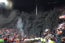 Man arrested as black smoke engulfs stands at PSV-Ajax clash