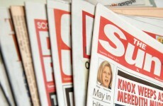 British police arrest 5 in tabloid bribery probe