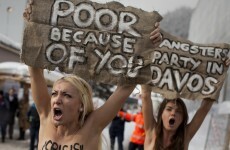 Slideshow: Topless protesters arrested at Davos summit