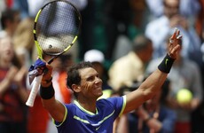 Nadal matches Federer's record at French Open as he powers into quarters