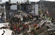 More than 40 people trapped after building collapses in Lahore