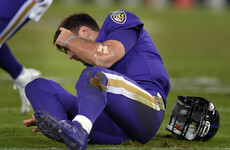 Horror hit on Joe Flacco overshadows Ravens' rout of Dolphins